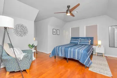 Bedroom 1 features a cozy queen-sized bed and plenty of space!