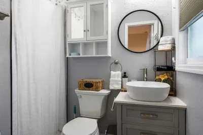 Freshen up in this charming bathroom with a stylish vanity, modern fixtures, and a clean, bright design. Thoughtfully stocked and comfortable, it’s perfect for a refreshing start or end to your day.