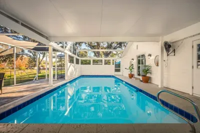 Enjoy refreshing swims in this spacious, screened-in pool surrounded by comfortable lounging areas. Designed for relaxation and fun, it’s the perfect spot to cool off, unwind, and enjoy your own private oasis.