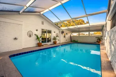 Dive into this private screened-in pool, perfect for year-round enjoyment. Bright, spacious, and inviting, it’s ideal for morning swims, family fun, or unwinding poolside in a peaceful, resort-style setting.