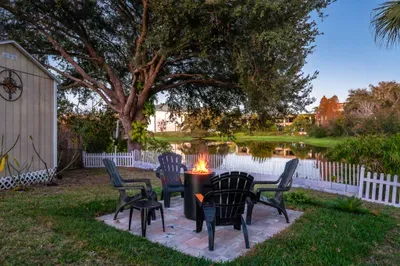 Gather around the lakeside fire pit with comfortable seating and tranquil water views. Perfect for cozy evenings, roasting marshmallows, and enjoying peaceful sunsets in a relaxing outdoor setting.