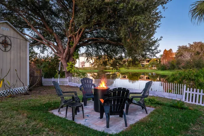 Gather around the lakeside fire pit with comfortable seating and tranquil water views. Perfect for cozy evenings, roasting marshmallows, and enjoying peaceful sunsets in a relaxing outdoor setting.