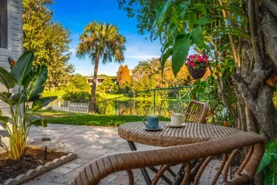 Enjoy peaceful mornings on the charming patio with cozy seating and lush tropical views. Sip coffee, relax in the shade, and take in the serene surroundings—perfect for quiet moments or unwinding after a day of exploring.