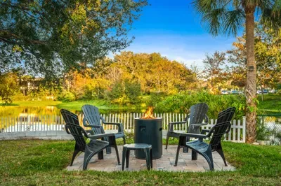 Unwind by the scenic lake at the cozy fire pit, surrounded by Adirondack chairs and peaceful nature views. Perfect for sunset chats, stargazing, and relaxing evenings with crackling flames and fresh air.