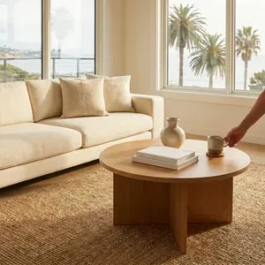 Coastal living room with sofa, coffee table, and ocean view