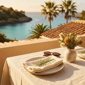 Table setting on a balcony overlooking a tropical bay