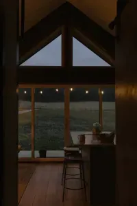 Twilight at The Haven — where the air is warm, the cicadas sing, and fireflies dance through the meadow.