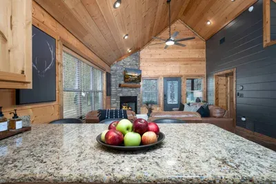 Living Room: Vaulted ceilings and stunning decor create the perfect retreat for relaxation!