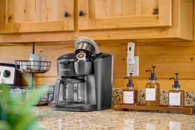 Kitchen: Brew your perfect morning with a stylish Keurig and gourmet syrups at your fingertips!