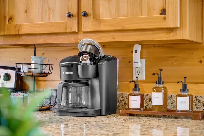 Kitchen: Brew your perfect morning with a stylish Keurig and gourmet syrups at your fingertips!