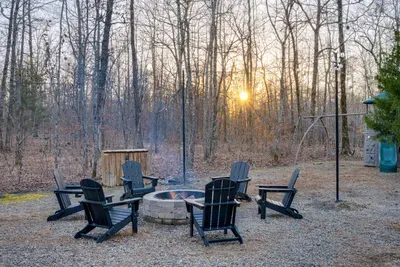 Fire Pit Retreat: Gather 'round the fire for storytelling and starry nights in nature's embrace!