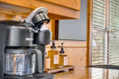 Kitchen Delight: Brew your morning magic with a gourmet coffee station and sweet syrup selections!