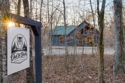 Exterior: Discover serenity in this charming cabin surrounded by nature’s beauty!