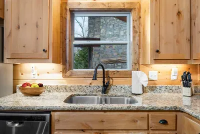 Kitchen Paradise: Whip up culinary delights in this stylish, well-equipped kitchen with nature views!