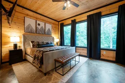 Master Suite: Enjoy serene views and stylish decor in this spacious retreat! Dreamy nights await!