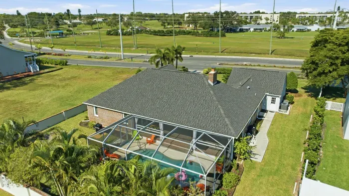 Private screened pool oasis, spacious yard, minutes to golf & shops