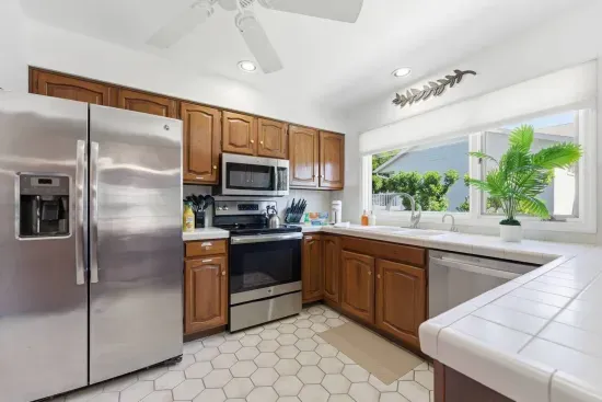Cook up a big group breakfast in a kitchen stocked with everything you need, from the stainless fridge to the dishwasher.