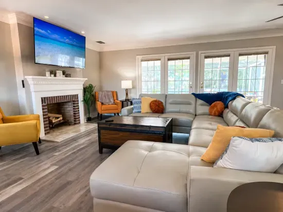 Gather the group on the oversized sectional and warm up by the fireplace after a full day of Florida sun.