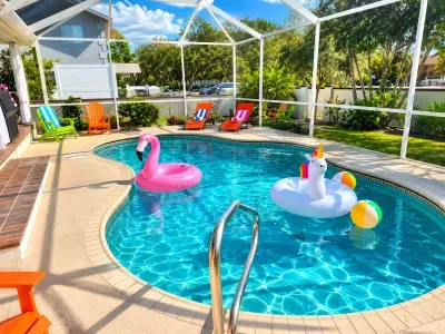 Race your friends to the flamingo float and claim the best spot in the screened pool before anyone else does.