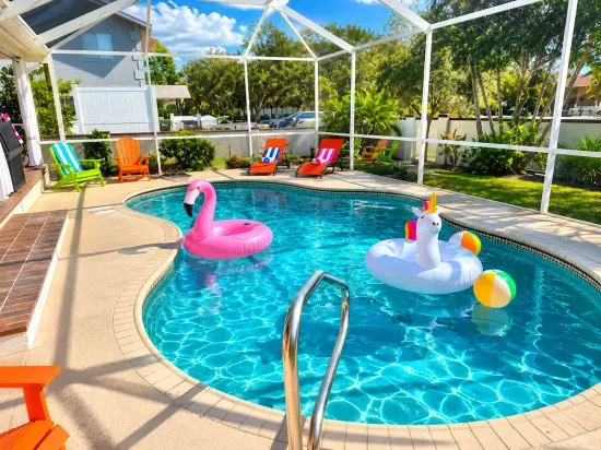 Race your friends to the flamingo float and claim the best spot in the screened pool before anyone else does.