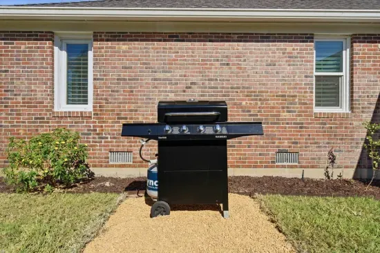 Grab the gas grill for an easy cookout right outside the pool area
