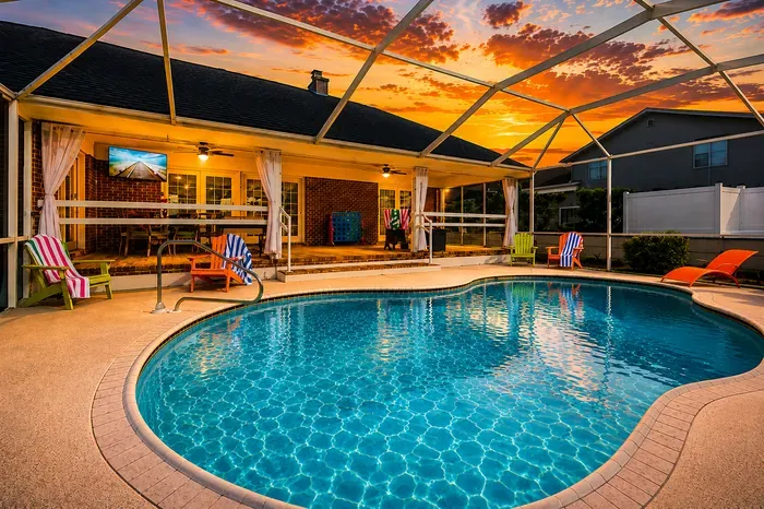 Watch the sky turn pink and orange from the screened pool as the day winds down.