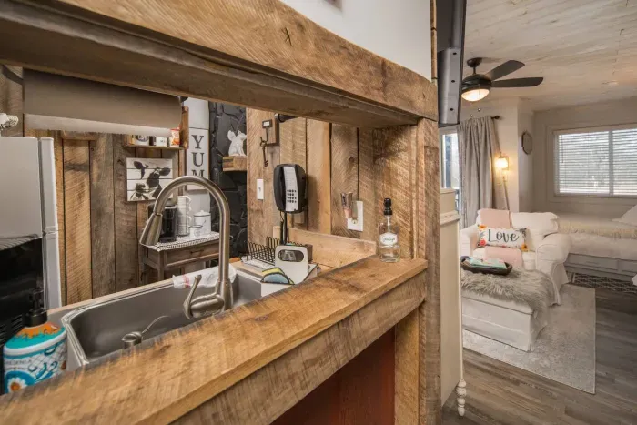 Cross the threshold into our French Country-inspired condo and be greeted by an ambiance that exudes a blend of rustic allure and chic sophistication. The entryway sets the stage for an exquisite experience, adorned with tasteful furnishings