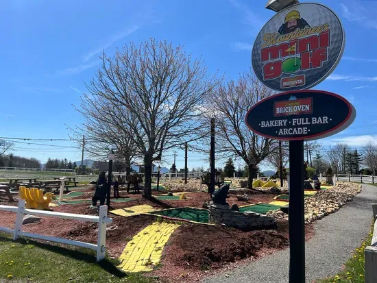 Experience the thrill of mini golf with a mountain twist at Mountain Mini Golf by Brick Oven!  Situated in the heart of Beech Mountain, our scenic course combines the excitement of traditional mini golf with the breathtaking beauty of the  mountains