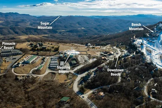 Nestled amidst the picturesque landscapes, Pinnacle Inn offers a tranquil retreat with sweeping views of iconic landmarks. Behold the majesty of Grandfather Mountain and Sugar Mountains standing tall and proud against the horizon.