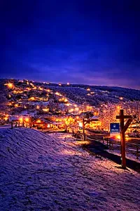 Cozy alpine village views—steps to lodge, lights, and slopes