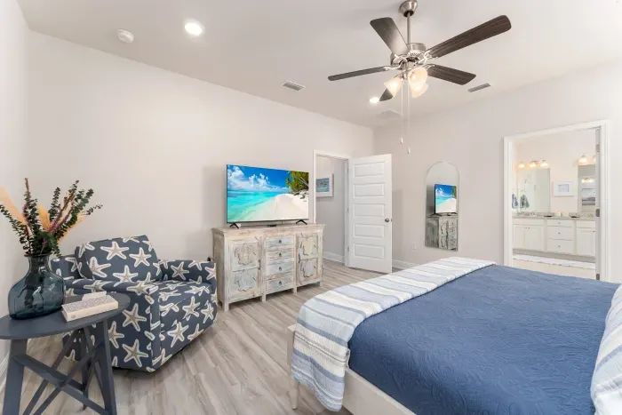 Need a few minutes to yourself - escape to the serene master bedroom.