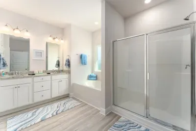 Large master bathroom with soaking tub and seperate shower. 