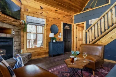 Relax beside the fireplace and take in the cozy ambiance of the cabin.