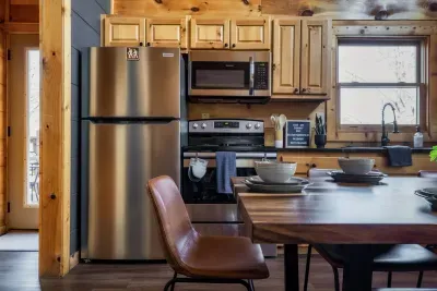 Enjoy meals together in a warm and inviting cabin setting.