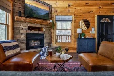 Cozy up by the fireplace and enjoy the warmth of cabin living.