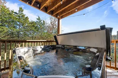 Hot Tub Retreat: Unwind in this bubbling oasis under twinkling lights and vibrant sunsets!