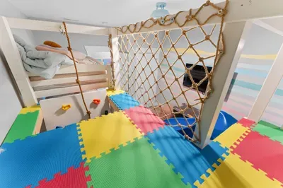 Who can you see coming into the play area from up here?