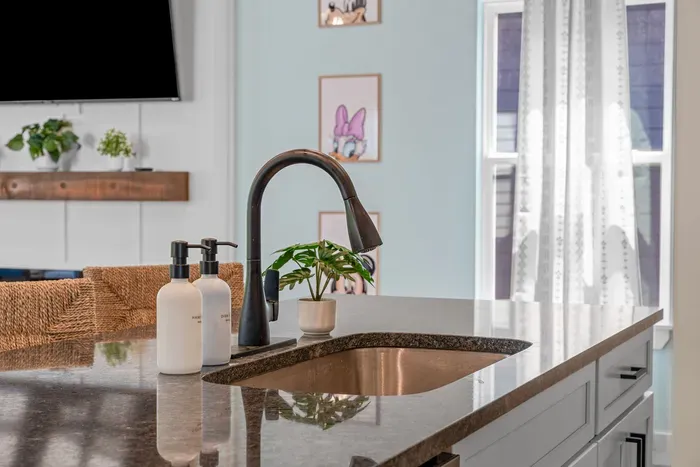 Modern finishes and a sleek faucet make this kitchen as functional as it is beautiful.