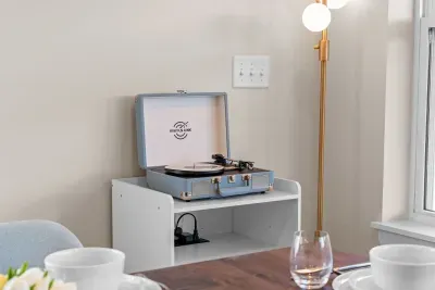 Spin your favorite tunes and set the perfect vacation soundtrack. 🎵📻