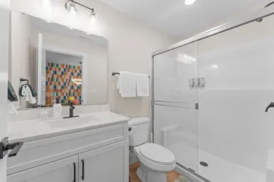 A convenient bathroom just steps away from the game room for uninterrupted fun.