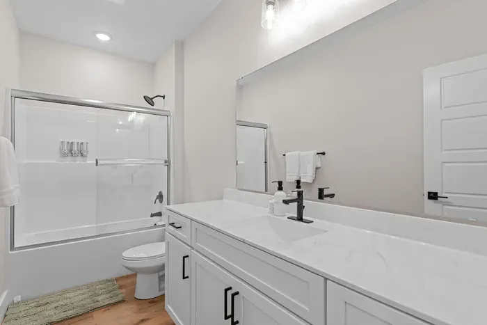 Refresh and recharge in this clean and inviting bathroom.