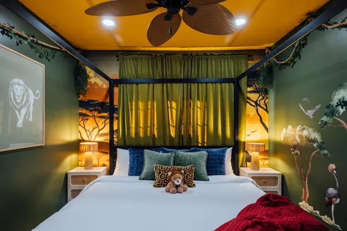 Cozy Lion King-inspired bedroom featuring nature tones and fun themed details for a memorable stay.
