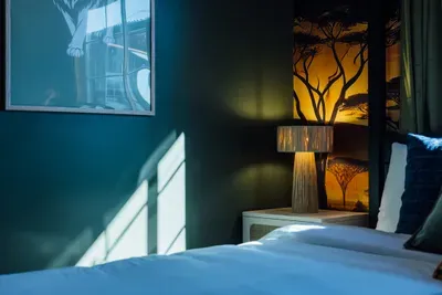 Beautifully designed Lion King-themed bedroom featuring immersive safari décor and a warm, storybook-like atmosphere.