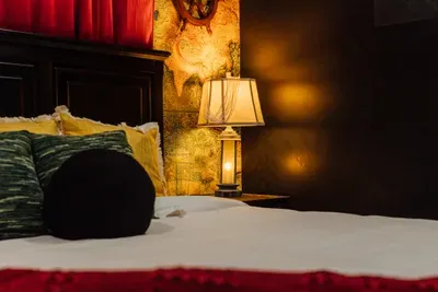 A fun Pirates of the Caribbean-inspired retreat with striking dark tones and captivating pirate décor.