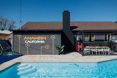 A relaxing pool area with comfortable outdoor seating, perfect for lounging, socializing, and enjoying the sunny surroundings.