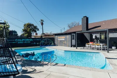 Immaculate private pool designed for ultimate relaxation, swimming, and day-to-night enjoyment.