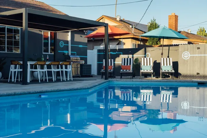 Spacious backyard with plenty of open space, perfect for relaxing, hanging out, or enjoying time outdoors in a peaceful setting.