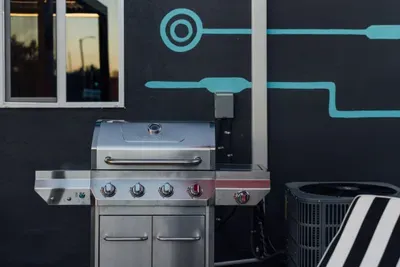 Outdoor grill area perfect for cooking and entertaining, ideal for BBQs and enjoying meals in a relaxed open-air setting.