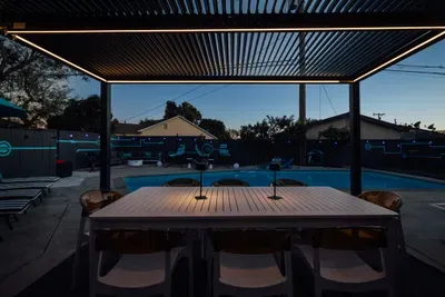 A cozy and private backyard space, perfect for unwinding, enjoying quiet moments, or spending time with friends and family outdoors.