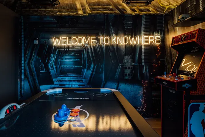 Fun-filled game room designed for entertainment and relaxation, perfect for guests of all ages to enjoy indoor activities and bonding time.